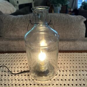 Vtg Style Clear Glass Bottle with Electric Candle Primitive Lamp Wire Handle 11"